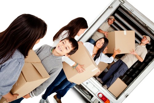 Van and moving boxes representing transparent local moving prices
