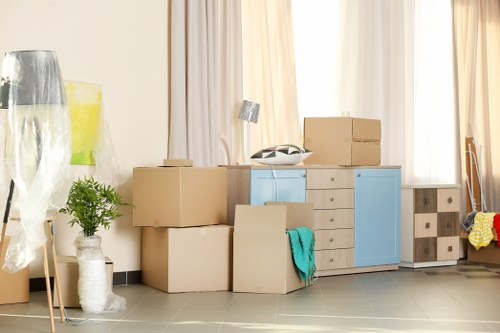 Removal team planning a move in Shepherds Bush with residential buildings nearby