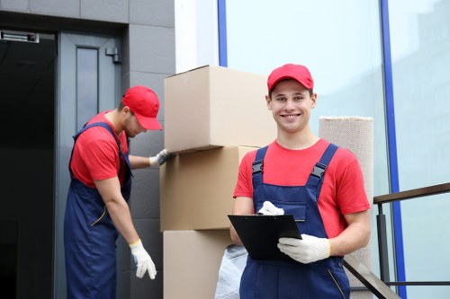 Local mover carrying items in a West London flat