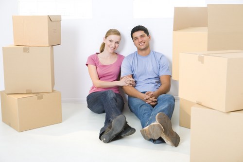 Packed boxes and furniture ready for transport in Shepherds Bush