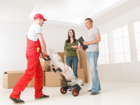 Removal team loading items into a truck for a local move
