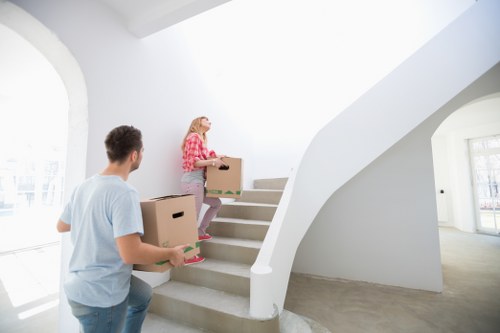 Packed boxes and furniture ready for relocation