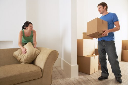 Loading boxes and furniture into a van for a west London move