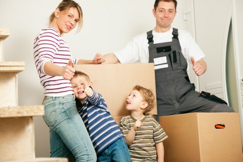 Local moving van handling furniture near Shepherds Bush residential streets